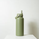 Byron 1L Drink Bottle in Bottle Green Colour on a table