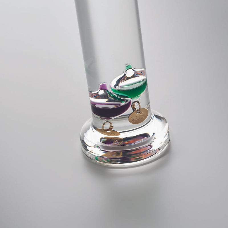 Galileo thermometer in glass
