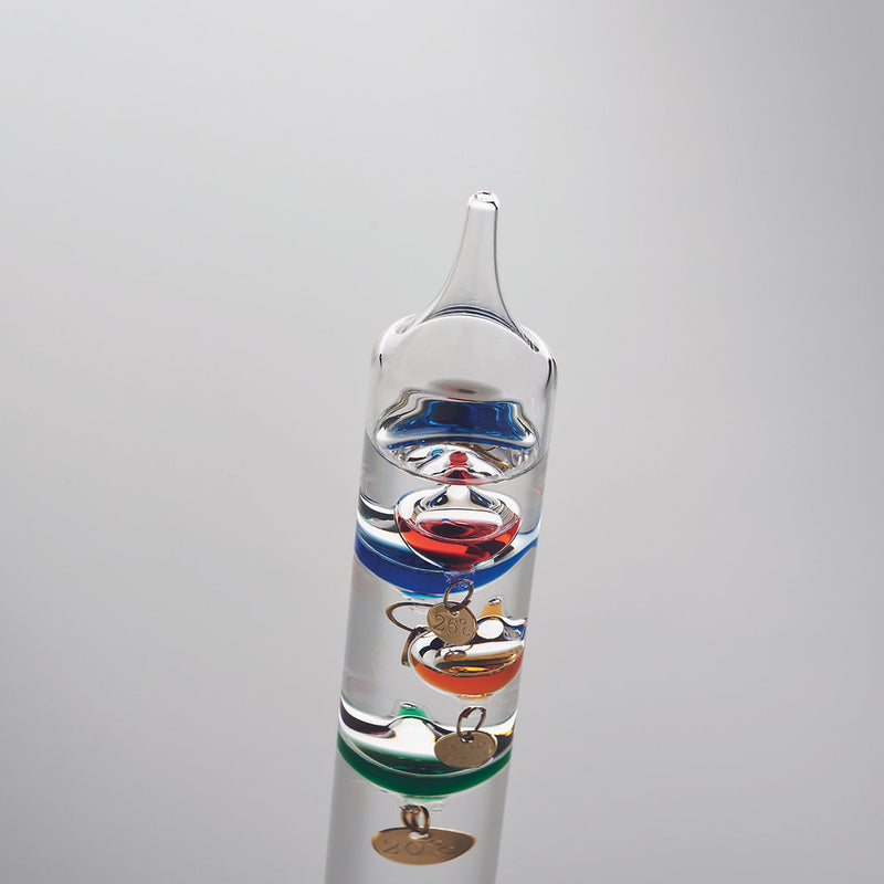 Galileo thermometer in glass