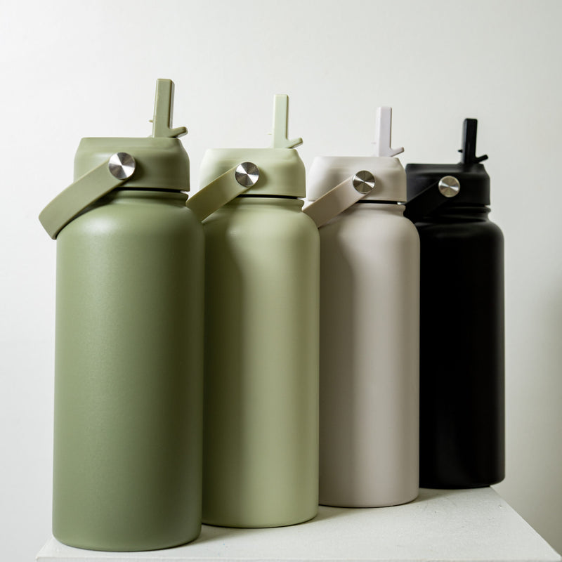 Byron 1L Drink Bottles in 4 different colours side by side.